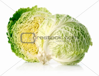 fresh green cabbage fruit with cut isolated on white