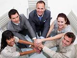 High angle of business team with hands together