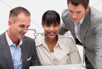 Businesswoman working with two colleagues