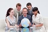 Business team holding the world. Global expansion