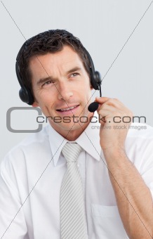 Mature businessman working in a call center