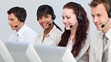 Ethnic woman working with her team in a call center