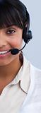 Close-up of an ethnic businesswoman with a headset on