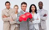 Confident businessman boxing and leading his team