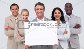 Business team holding a white card