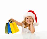 Happy little girl christmas shopping