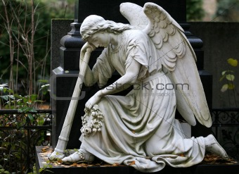 Stone Statue of angel in a Cemetery
