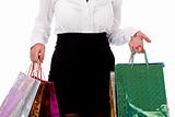 Woman holding shopping bags half length shot