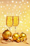 Champagne and golden Christmas ornaments