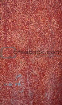 Closeup of a red plastic siding