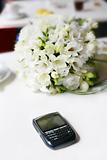 Wedding bouquet with the phone