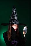 portrait of an eleven years old girl dressed as a witch 
