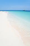 white beach blue sea