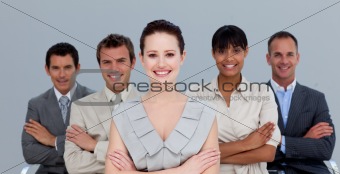 Multi-ethnic business team with folded arms