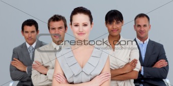 Confident multi-ethnic business team with folded arms
