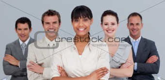 Confident multi-ethnic business team standing in front of the camera