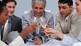 Close-up of a happy architectutal team toasting with champagne