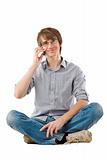 Handsome young man talking by mobile phone
