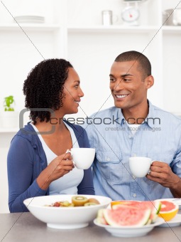 Smiling lovers having healthy breakfast