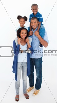 Family giving children piggyback ride 