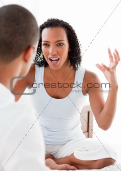 Close-up of a Young couple having an argument in the bedroom
