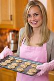 Attractive Blond Woman Baking Chocolate Chip Cookies