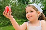 Little girl holding Easter egg