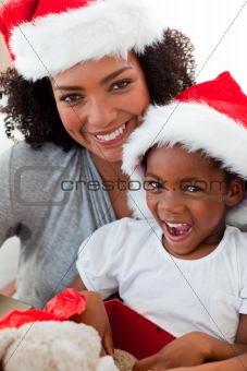Mother and daughter having fun at Christmas time