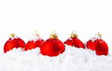 Christmas holiday decoration with white snow and red bowls