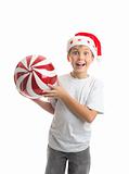Child boy holding Christmas bauble decoration