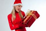 Attractive santa girl with presents