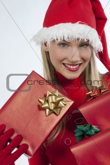 Attractive Santa girl with presents