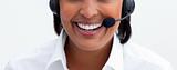 Close-up of a smiling businesswoman with headset on
