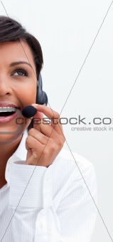 Smiling businesswoman with headset on 