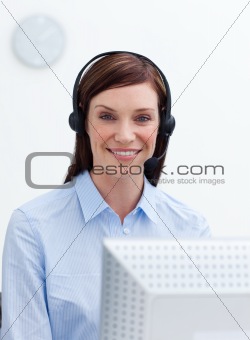 Attractive businesswoman with headset on