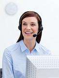 Laughing businesswoman with headset on