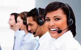 Attractive young woman working in a call center 