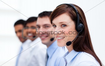 Business team with headset on working in a call center