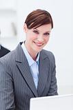 Portrait of a smiling businesswoman working