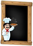 Blackboard with chef holding pizza