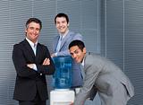 Multi-ethnic business team at water cooler