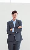 Attractive businesswoman with folded arms 