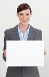 Smiling businesswoman holding white card 