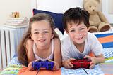 Siblings playing video games together