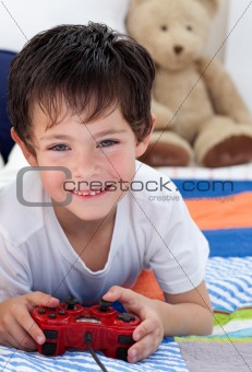 Little boy playing video games