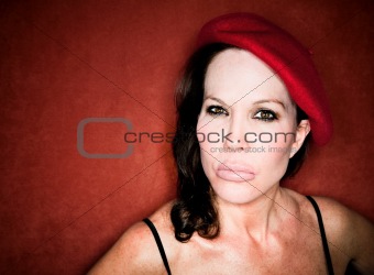 Pretty woman in a red beret
