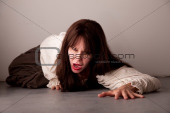 Female victim crawling on the floor