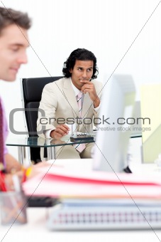 Businessmen with a laptop at the office