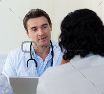Male doctor explaining diagnosis to a patient