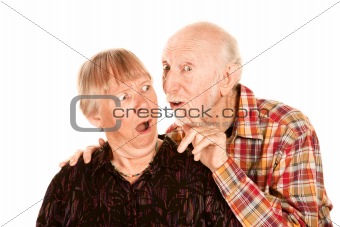 Man talking to shocked wife